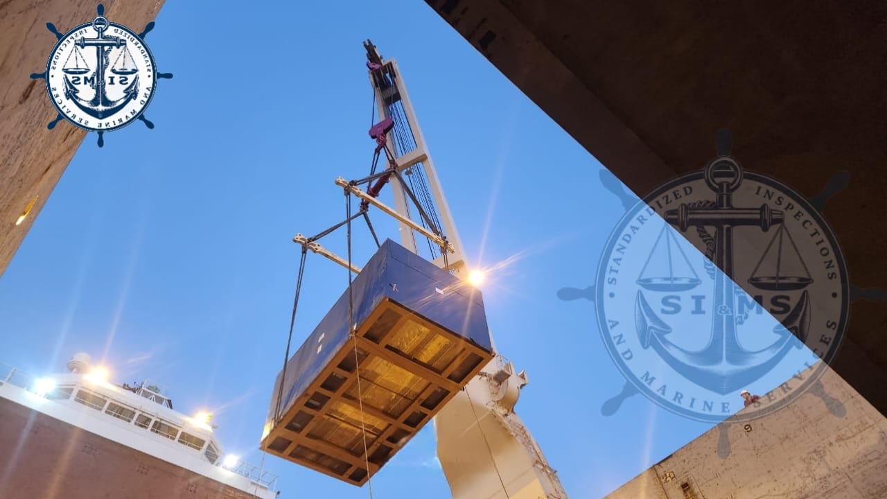 Heavy-lift cargo craned into the hold under survey